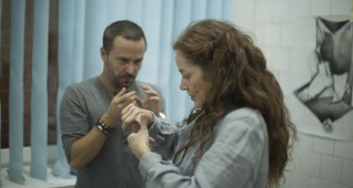 Left to right: Director/co-writer/editor William Brent Bell discusses a scene with Suzan Crowley (as Maria) on the set of THE DEVIL INSIDE, from Insurge Pictures.
