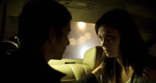 Left to right: Simon Quarterman plays Fr. Ben Rawlings and Fernanda Andrade plays Isabella Rossi in THE DEVIL INSIDE, from Insurge Pictures.