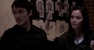 Left to right: Simon Quarterman plays Fr. Ben Rawlings and Fernanda Andrade plays Isabella Rossi in THE DEVIL INSIDE, from Insurge Pictures.