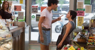 The Dictator (center) and Zoey (Anna Faris, right) in THE DICTATOR, from Paramount Pictures. .FD-15596