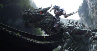 Left to right: Grimlock and Optimus Prime in TRANSFORMERS: AGE OF EXTINCTION, from Paramount Pictures.