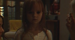 Ivy George plays Leila in Paranormal Activity: The Ghost Dimension from Paramount Pictures.